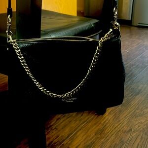 Coach purse can worn 2 ways gold chain it long black strap .
